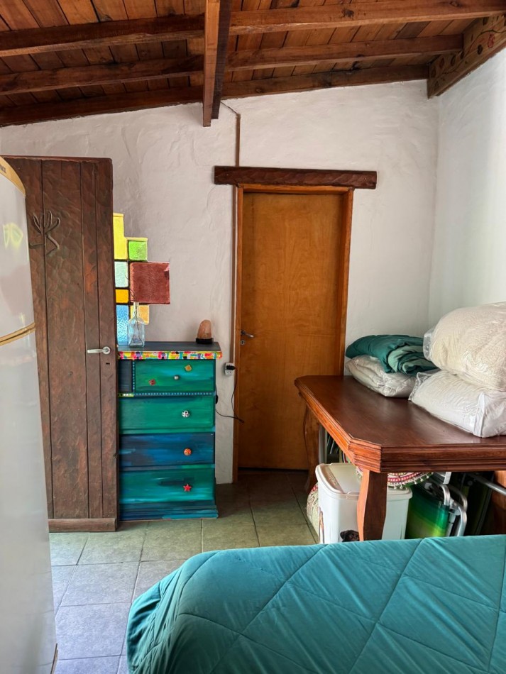 CASA TIPO CABAÑA DE 2 AMB CON PARQUE MAS DEPARTAMENTO EN BOSQUE PERALTA RAMOS. APTO CREDITO.