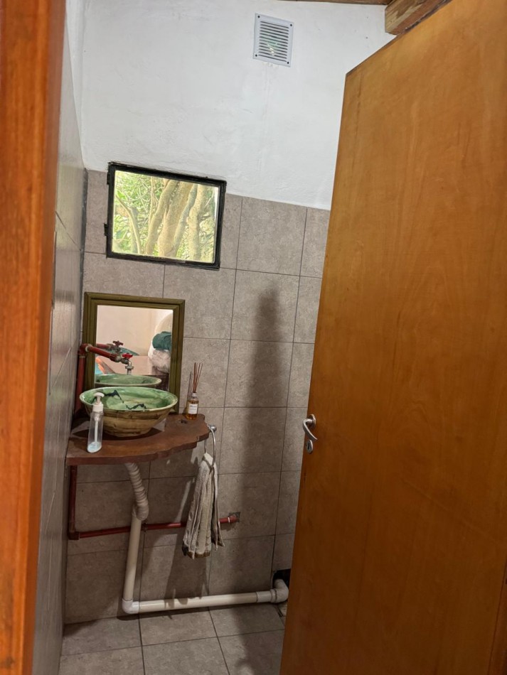 CASA TIPO CABAÑA DE 2 AMB CON PARQUE MAS DEPARTAMENTO EN BOSQUE PERALTA RAMOS. APTO CREDITO.